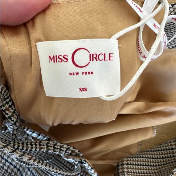 Miss Circle - Dacia Plaid Halter Lace Up Bubble Hem Mini Dress in Black White - Picture 4 of 7